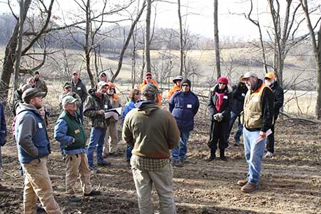 Group standing in the woods