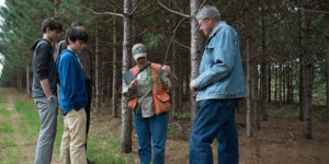 Forester with landowner family